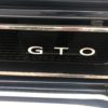 A Fun Unpretentious Car Show In 1965 it was unusual to have a logo or badge be offset as it is with the GTO